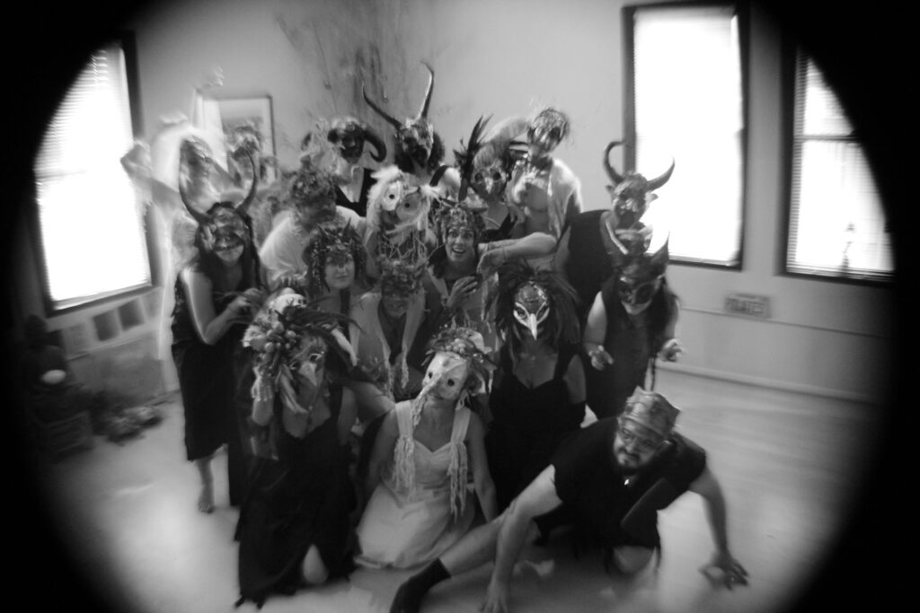 masked performers - group shot